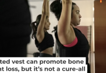 Jannelliz Barragan, center, wears a weighted vest during a workout class in New York on Aug. 13, 2025. AP Photo/Shelby Lum